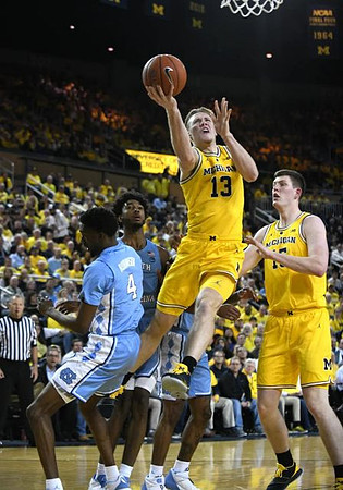 Ignas Brazdeikis (13) and Jon Teske (15)