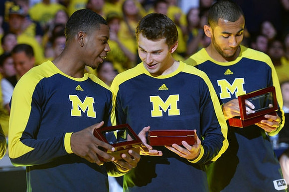 Glenn Robinson III (1), Nik Stauskas (11), and Jon Horford (15)