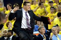 C.J. Lee, LaVall Jordan, Mitch McGary (4), Jeff Meyer, and John Beilein
