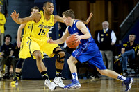 Jon Horford (15) and Nik Stauskas (11)