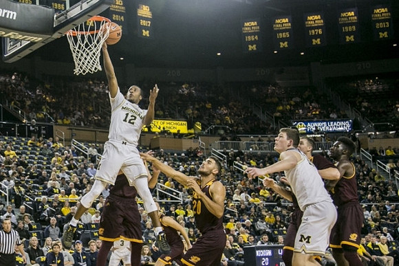 Muhammad-Ali Abdur-Rahkman (12) and Moritz Wagner (13)