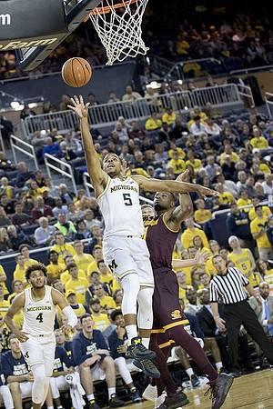 Isaiah Livers (4) and Jaaron Simmons (5)