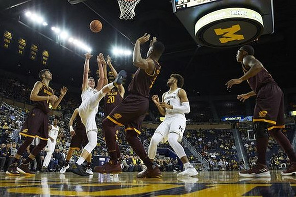 Charles Matthews (1), Moritz Wagner (13), and Isaiah Livers (4)