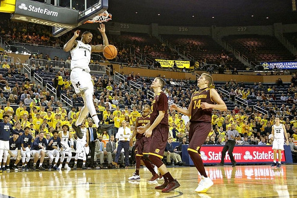 Charles Matthews (1), John Beilein, and Duncan Robinson (22)