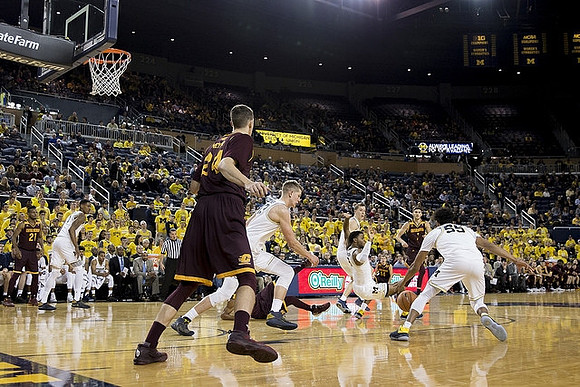 Charles Matthews (1), Moritz Wagner (13), Duncan Robinson (22), Zavier Simpson (3), and Eli Brooks (55)