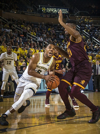 Jaaron Simmons (5) and Muhammad-Ali Abdur-Rahkman (12)