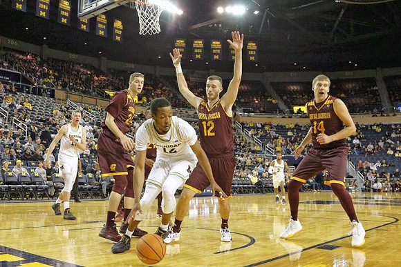 Charles Matthews (1) and Moritz Wagner (13)