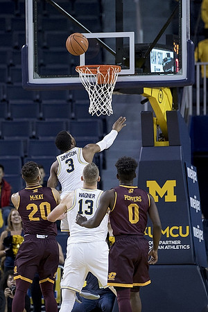 Jaaron Simmons (5) and Moritz Wagner (13)