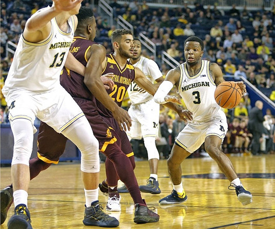 Moritz Wagner (13), Muhammad-Ali Abdur-Rahkman (12), and Zavier Simpson (3)