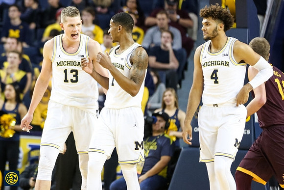 Moritz Wagner (13), Charles Matthews (1), and Isaiah Livers (4)