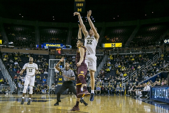 Muhammad-Ali Abdur-Rahkman (12) and Duncan Robinson (22)