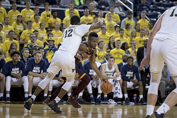 Muhammad-Ali Abdur-Rahkman (12) and Moritz Wagner (13)