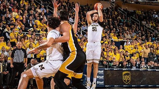 Brandon Johns Jr. (23) and Austin Davis (51)