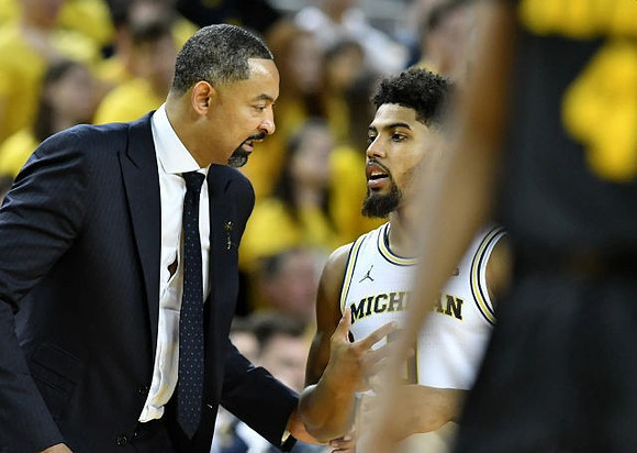 Juwan Howard and David DeJulius (0)