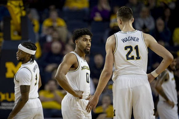 Zavier Simpson (3), David DeJulius (0), and Franz Wagner (21)
