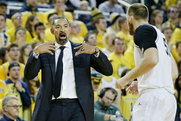 Juwan Howard and Austin Davis (51)