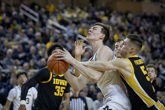 Brandon Johns Jr. (23) and Colin Castleton (11)