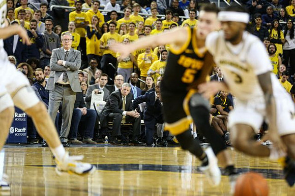 Iowa Head Coach Fran McCaffery and Zavier Simpson (3)