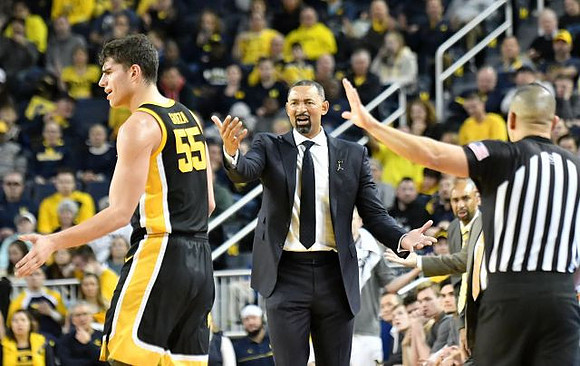 Juwan Howard and Saddi Washington