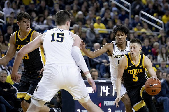 Jon Teske (15) and Eli Brooks (55)