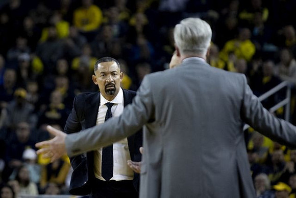 Juwan Howard and Iowa Head Coach Fran McCaffery
