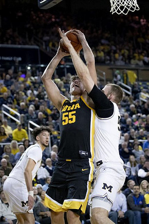 Brandon Johns Jr. (23) and Austin Davis (51)