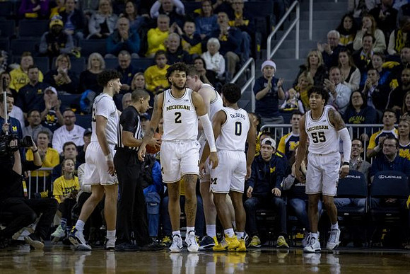 Brandon Johns Jr. (23), Isaiah Livers (2), Jon Teske (15), David DeJulius (0), and Eli Brooks (55)
