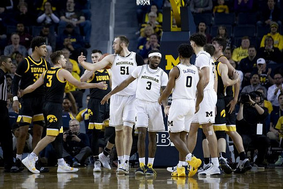 Austin Davis (51), Zavier Simpson (3), David DeJulius (0), and Brandon Johns Jr. (23)