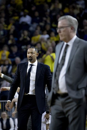 Juwan Howard and Iowa Head Coach Fran McCaffery