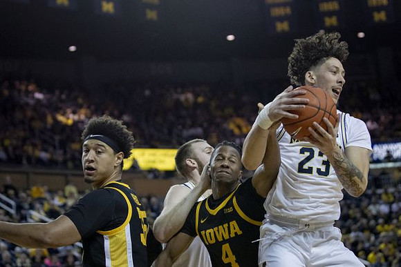 Austin Davis (51) and Brandon Johns Jr. (23)