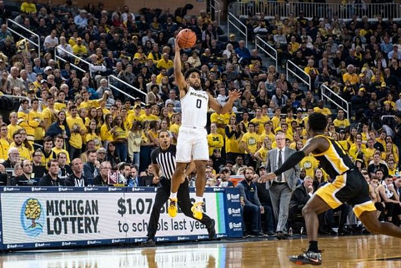 David DeJulius (0) and Iowa Head Coach Fran McCaffery