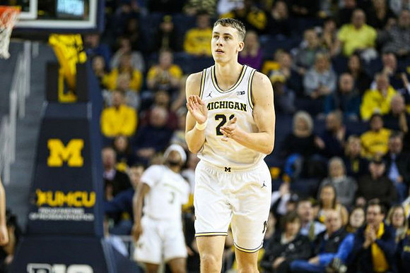 Zavier Simpson (3) and Franz Wagner (21)