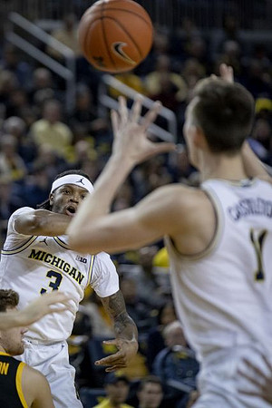 Zavier Simpson (3) and Colin Castleton (11)