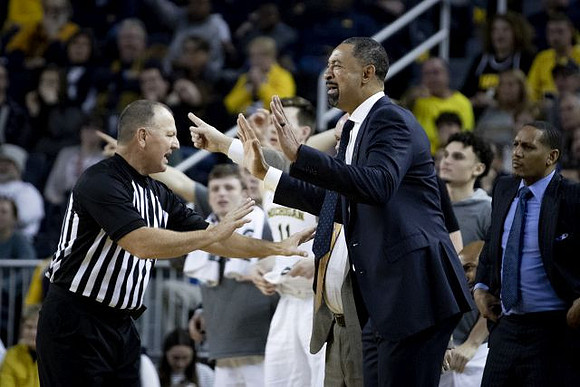 Juwan Howard and Howard Eisley