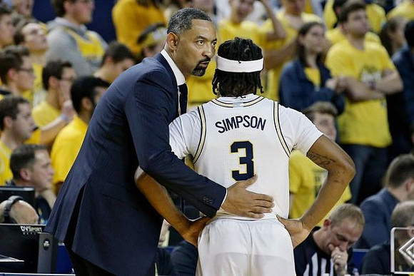 Juwan Howard and Zavier Simpson (3)