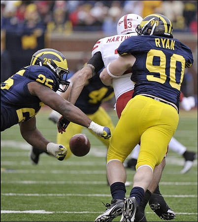 Kenny Demens (25) and Jake Ryan (90)
