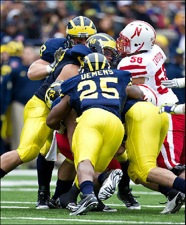 Craig Roh (88), Kenny Demens (25), and Mike Martin (68)