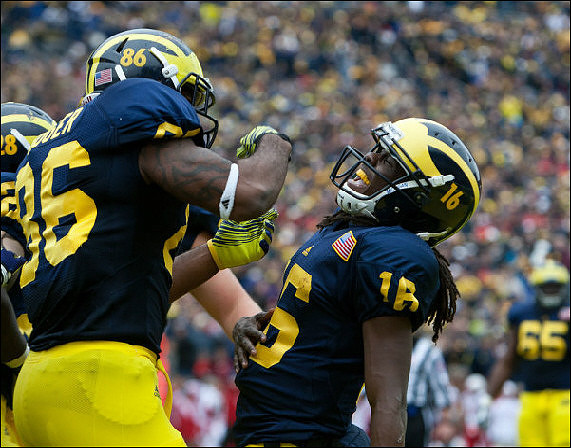 Fitzgerald Toussaint (28), Kevin Koger (86), Denard Robinson (16), and Patrick Omameh (65)