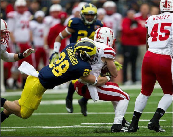 Fitzgerald Toussaint (28) and Delonte Hollowell (24)