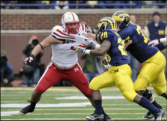 Fitzgerald Toussaint (28) and Taylor Lewan (77)