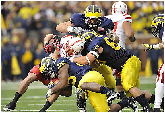 Kenny Demens (25), Mike Martin (68), Ryan Van Bergen (53), and Jake Ryan (90)