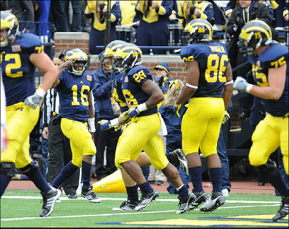 Mark Huyge (72), Denard Robinson (16), Fitzgerald Toussaint (28), Kevin Koger (86), and Michael Schofield (75)