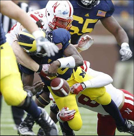 Denard Robinson (16) and Patrick Omameh (65)