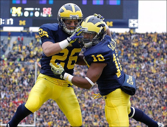 Drew Dileo (26) and Jeremy Gallon (10)
