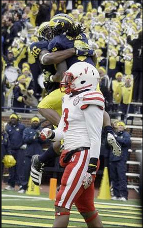 Kevin Koger (86) and Martavious Odoms (9)