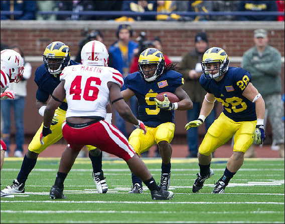 Cameron Gordon (4), Martavious Odoms (9), and Matthew Cavanaugh (28)