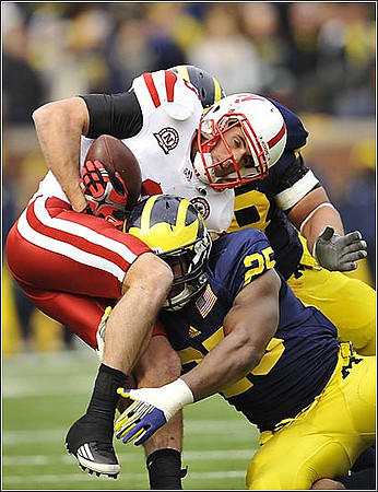 Kenny Demens (25) and Mike Martin (68)