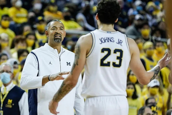 Juwan Howard and Brandon Johns Jr. (23)