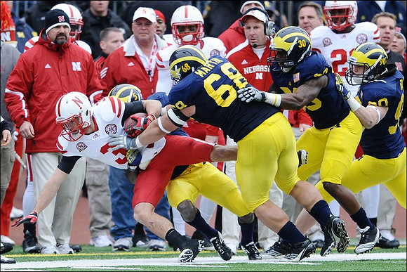 Courtney Avery (5), Mike Martin (68), Thomas Gordon (30), Jake Ryan (90), and Bo Pelini