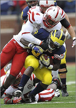 David Molk (50) and Fitzgerald Toussaint (28)
